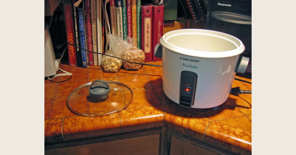 Illustrative stock photo of a countertop rice cooker.